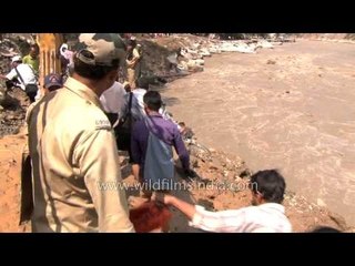 People travel for basic necessities on the risky damaged roads - Agastyamuni