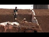 Making bricks at a rural kiln in India