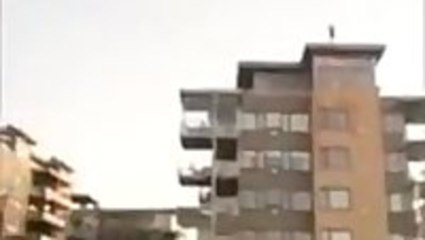 Crazy Guy Jumps Off Building Into Lake