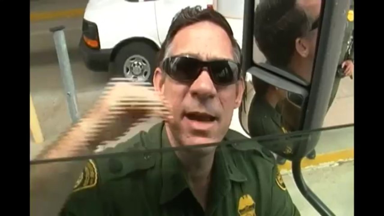 Cop at Suspicionless Checkpoint Starts Barking Orders, But Then Flees from Camera