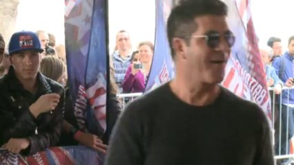 Simon Cowell 'expecting a baby' with friend's wife