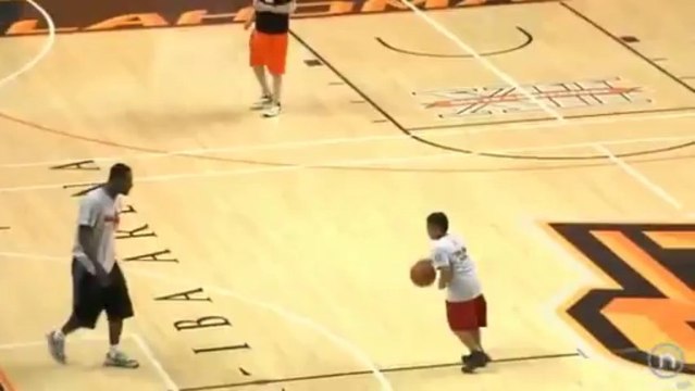 Tony Allen big block on a kid at his camp