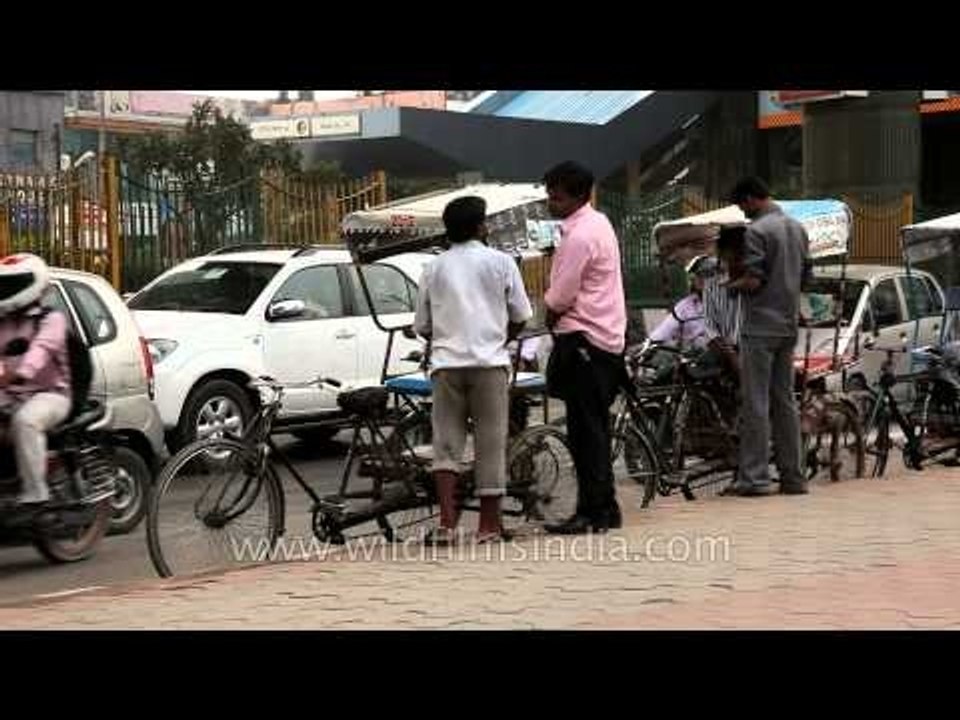 Rickshawallas caught scratching