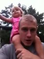 Adorable little girl loves piggy back rides