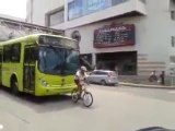 Biker trying to stop a Bus...Crazy Reaction of the driver!!!