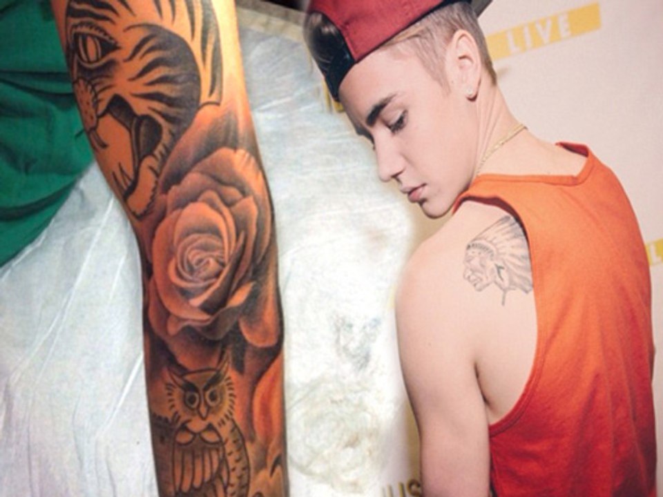 Justin Bieber Gets New Rose Tattoo