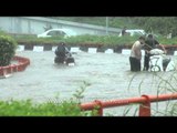 Vehicles crawl through flooded roads : India's proud capital!