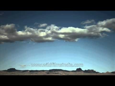 Clouds floating above blue sky
