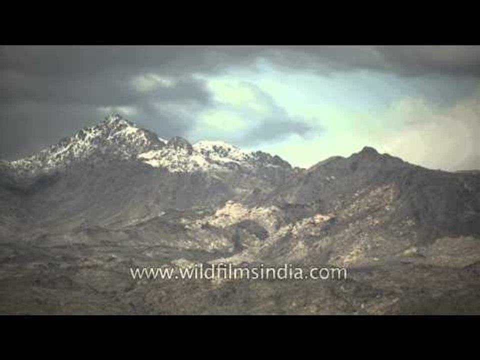 Clouds racing over the snow mountains of California