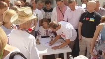 Tymoshenko supporters mark the Ukrainian leader's second...