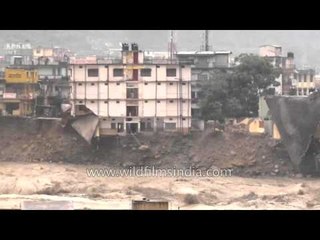 Building crashes into the river Ganga