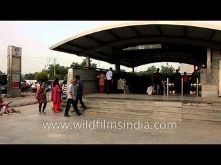 Commuters enter the Saket Metro Station