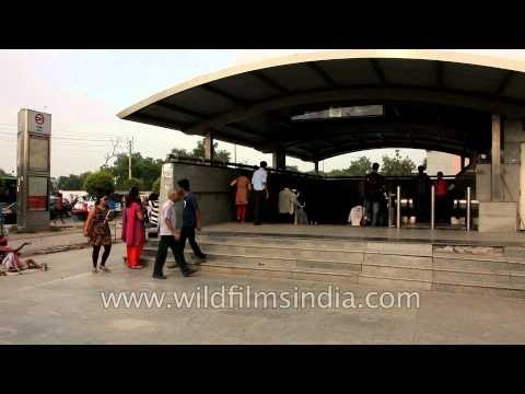 Commuters enter the Saket Metro Station