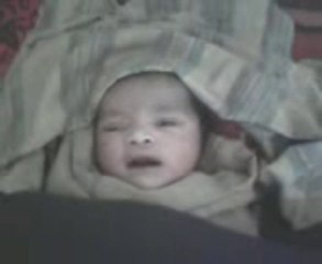 A new born baby is saying the name of ALLAH