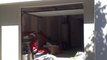 Porte de garage sectionnelle plafond Base Matic, finition Trend, blanche motorisée et posée par APG Accès Portes de garage
