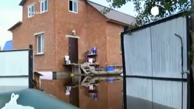 Summer on hold as part of Europe battered by storms