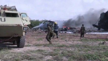 Military plane bursts into flames at Mogadishu airport