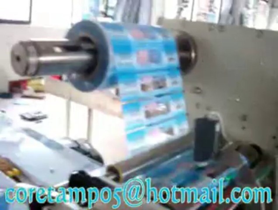 horizontal flow wrap machine @@ coretamp packing machine