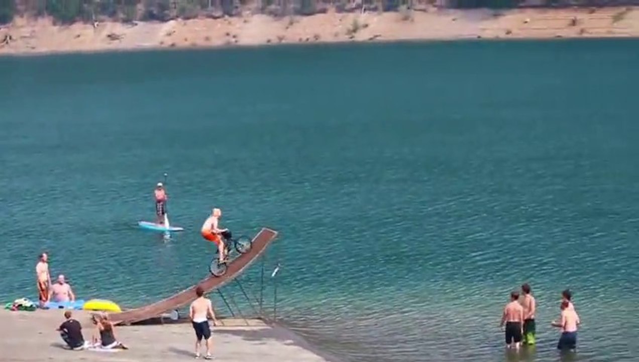 Biggest bicycle jump into a lake!! Great GoPro Video!!