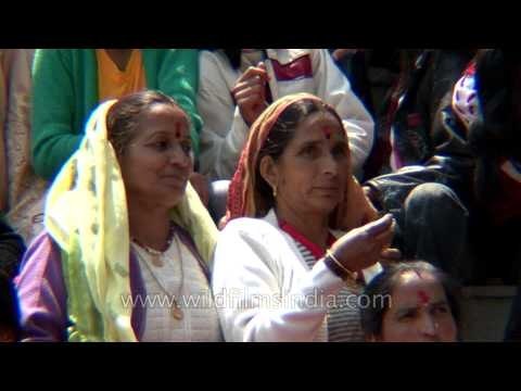 Women watch on as proceedings take place: Gangotri temple Puja