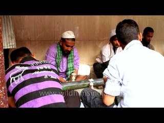 People performing wudu before Iftar at Nizamuddin Dargah