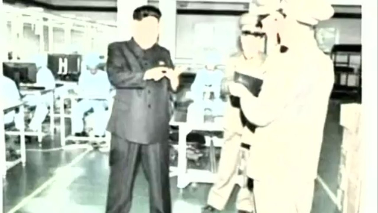 North Korean leader Kim Jong-un visits mobile phone factory