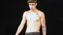 Justin Bieber Debuts his arm tattoo in concert