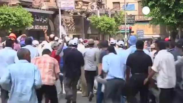 Clashes erupt in Cairo as police break up Mursi march