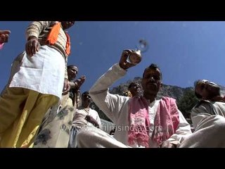 Devotees Applying Vermillion and Dancing in Gangotri Festival