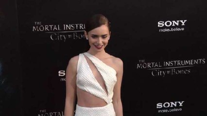 Lily Collins Sports a Racy White Dress