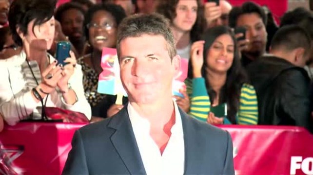 Simon Cowell refuse de voir la mère de son bébé avant que le drame ne s'estompe