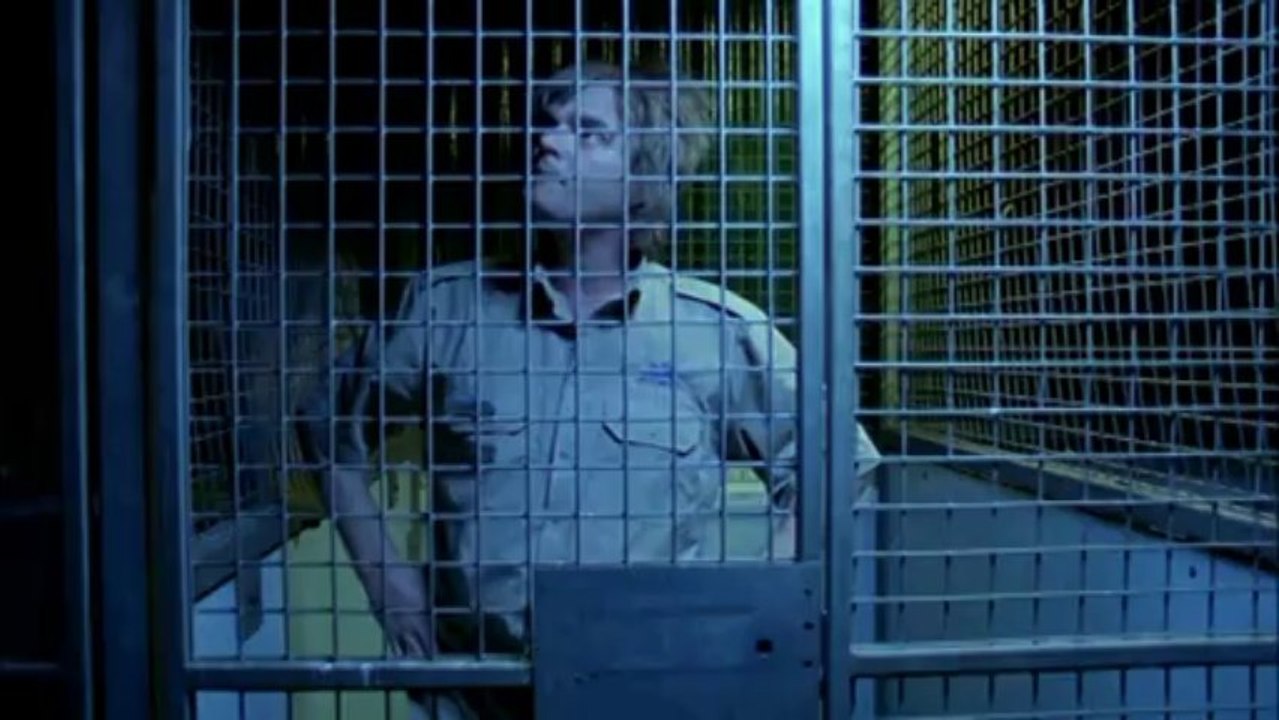 WILFRED BARKING BEHIND BARS