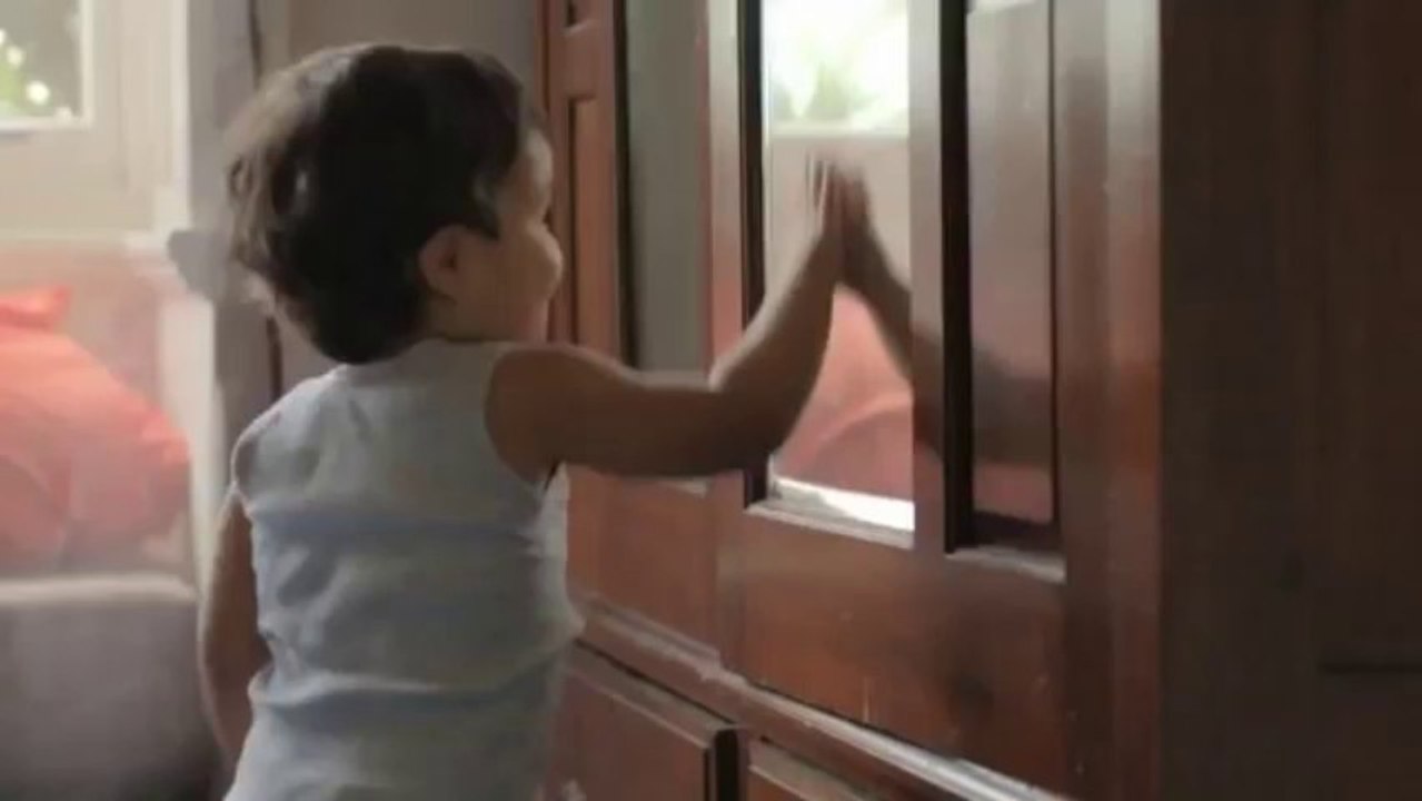 Cute boy kissing mirror from Medibank ad - outtakes _ Medibank