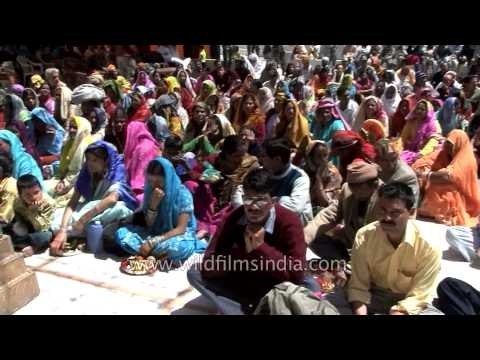 Devotees pray outside Gangotri temple