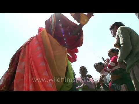 A priest performs rituals at Gangotri Dham
