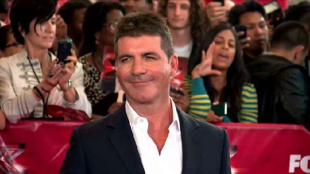Simon Cowell Refuses to See Baby Mama