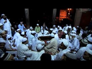 Imam of Jama Masjid on the last day of Ramadan pronouncing, Eid al Fitr
