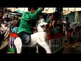 Kids enjoying rides on the occasion of Eid in Agra