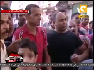 أهالي شارع 26 يوليو يحملون فوارغ الطلقات التي أطلقها عليهم المسلحين
