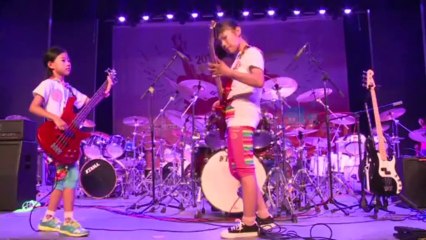 Clash of the mini-titans at China school of rock