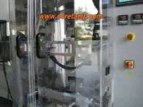 Volumeteric cup metering packing machine system