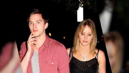 Lawrence and Hoult Arrive at Party