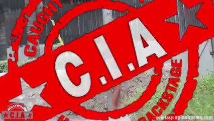 Claudia Romani showering in a blue bikini