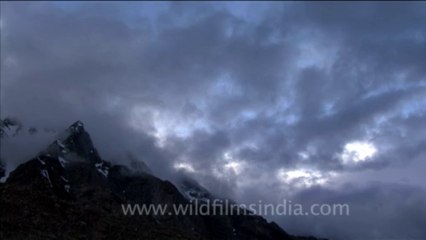 1728.Fast cloud and rocky spire time lapse in Himalaya