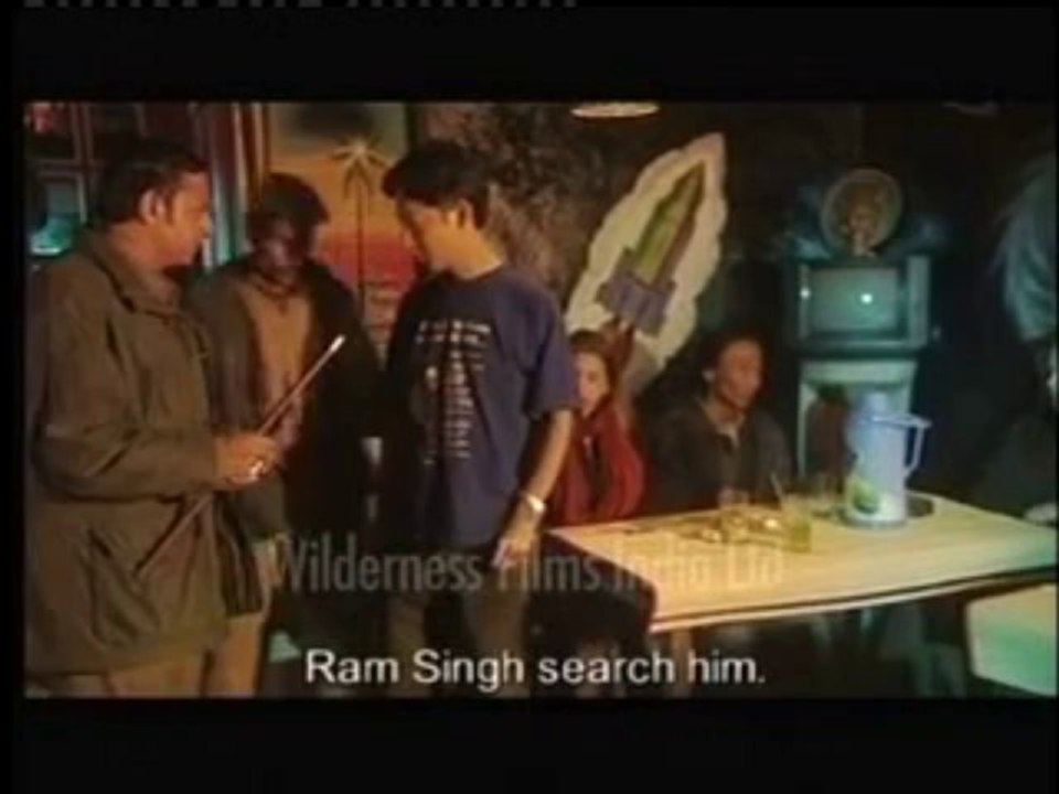 185. Gulshan Grover checks on locals in the pub