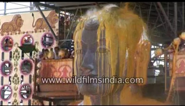 2188.Haldi or turmeric over Bahubali at Shravanabelagola