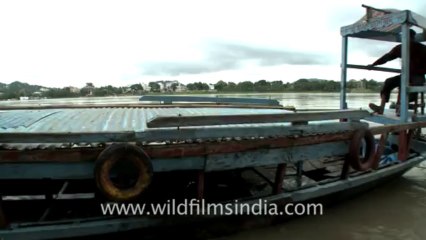 2282.Ferry moving in Brahmaputra river towards Umananda Island