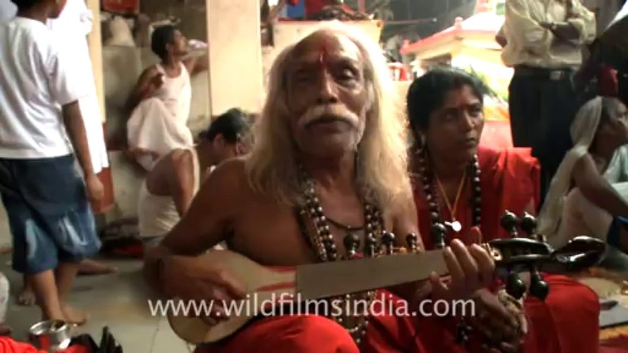 2316.Old baba singing a regional song in Ambubachi mela