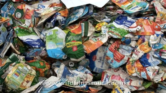 2697.Imported household waste at recycling yard...