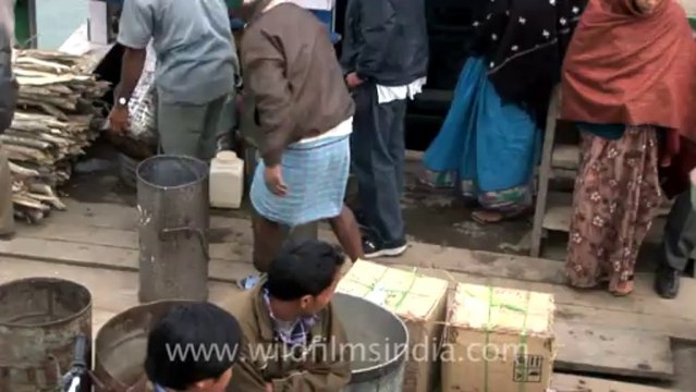 2707.Boat carrying milk for island community...